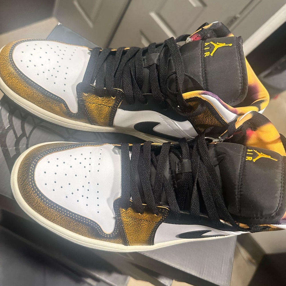 Air Jordan Sneakers with White and Gold Accents